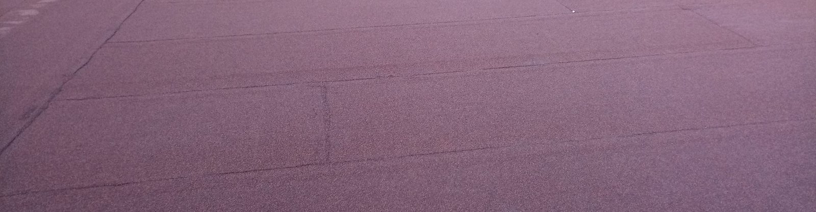 Impermeabilización de terraza con membrana asfáltica con autoprotección de gránulos minerales color marron